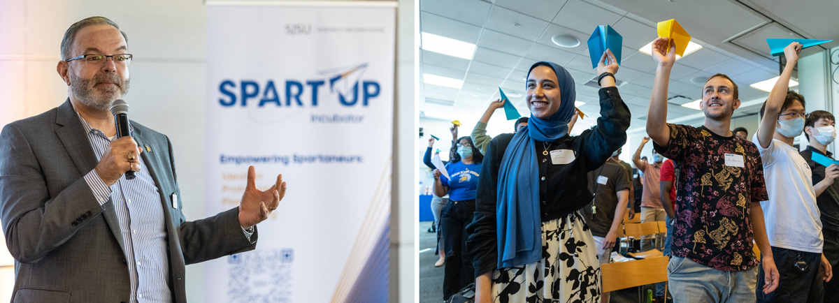 Students throwing paper airplanes during the first SpartUp event.