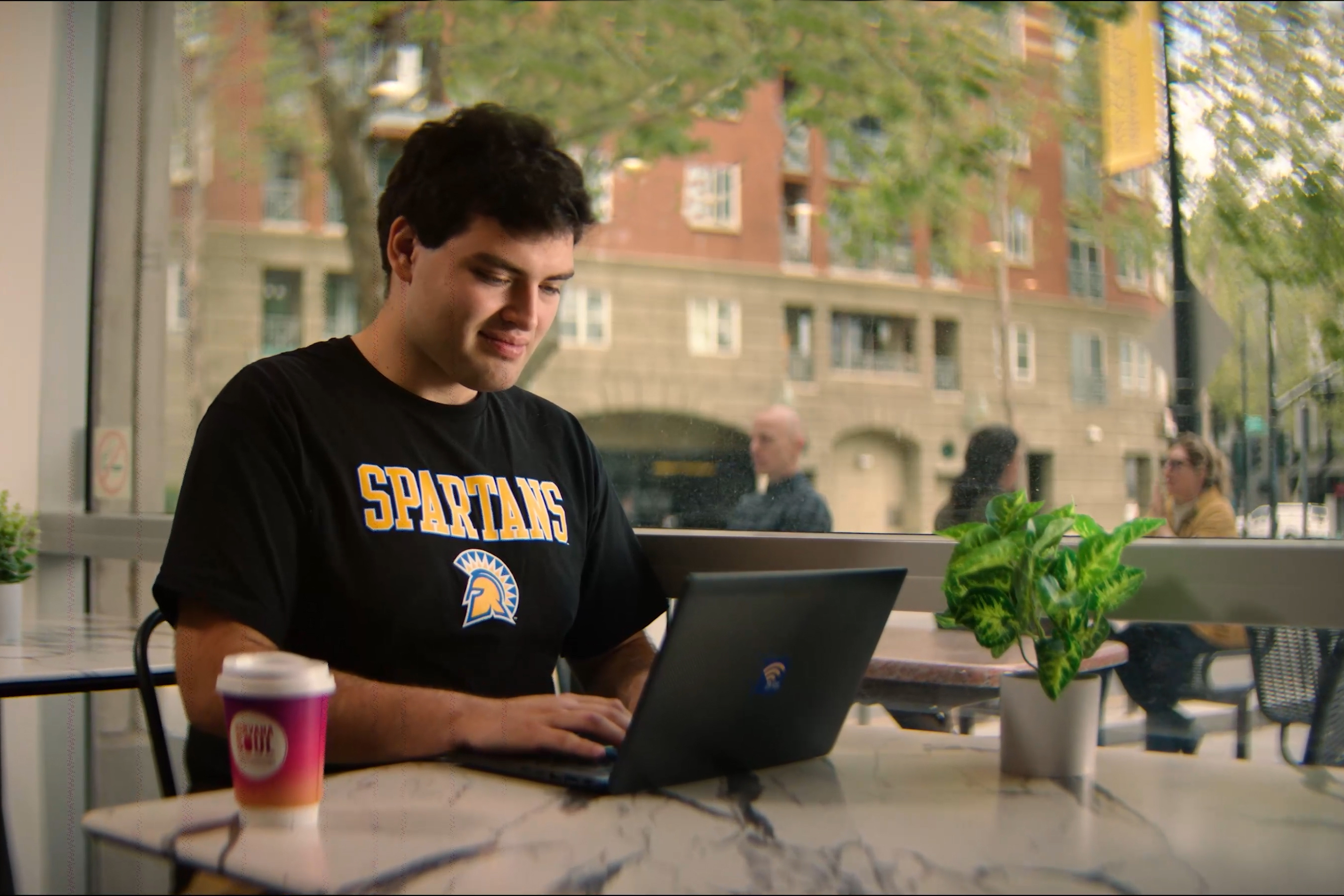 Student studying at a cafe