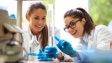 Two people working in a lab