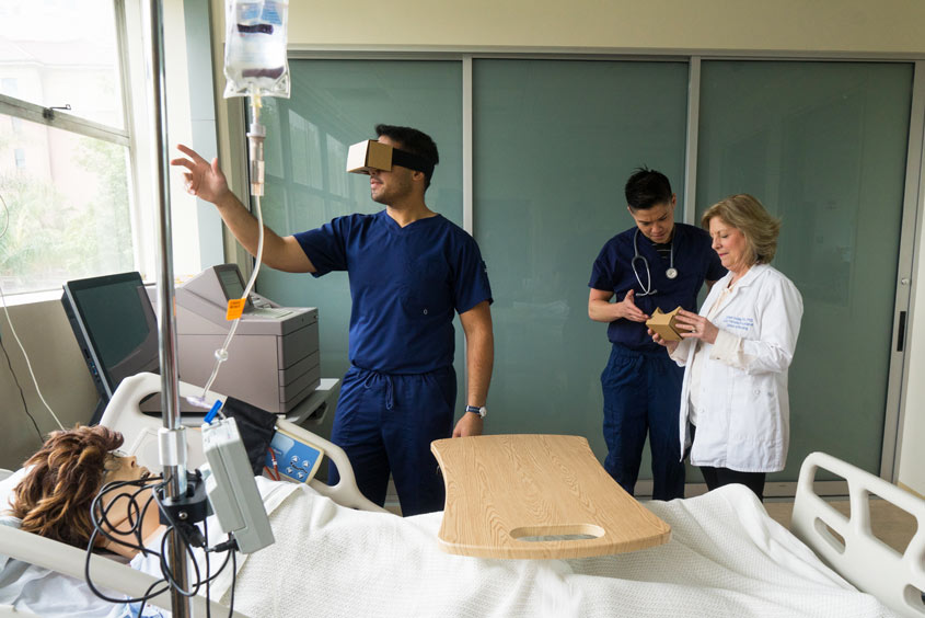 Nursing students wearing VR headsets.