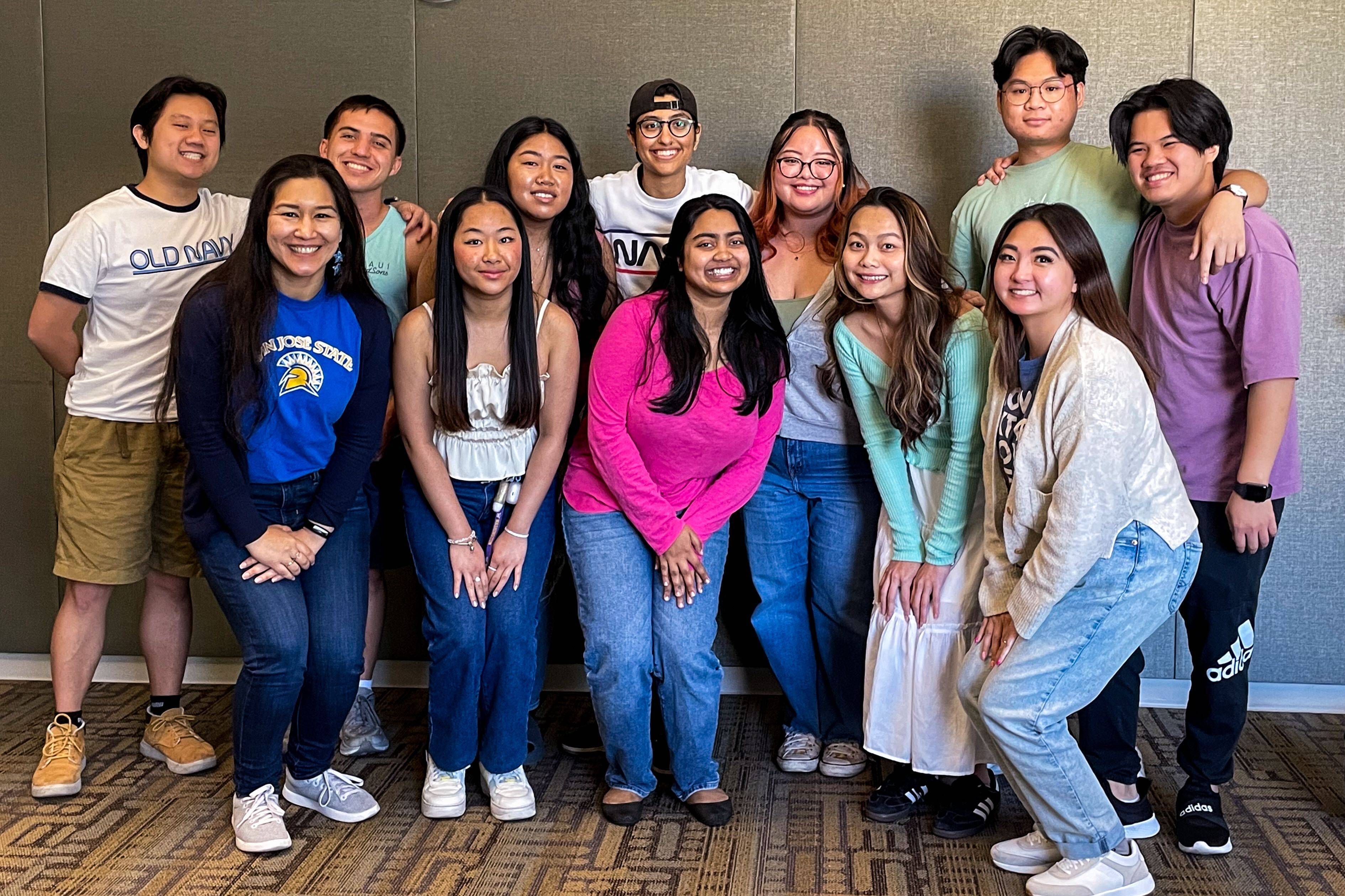 Students and staff posed in a group photo.