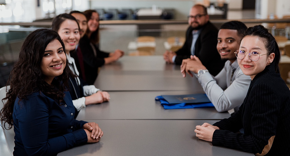 MBA Students Sitting at table