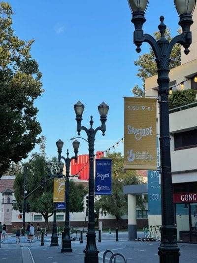 paseo de san antonio with lamp posts walkway and signage