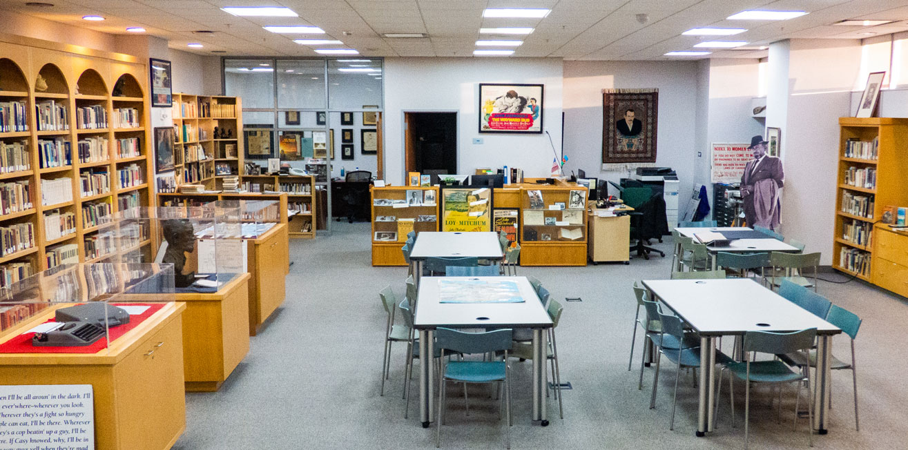 Interior of the Steinbeck Center showing bookshelves and desks